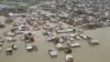 This handout photo from the Iranian president's office shows an aerial view of flooding in Golestan province, Iran, March 27, 2019.