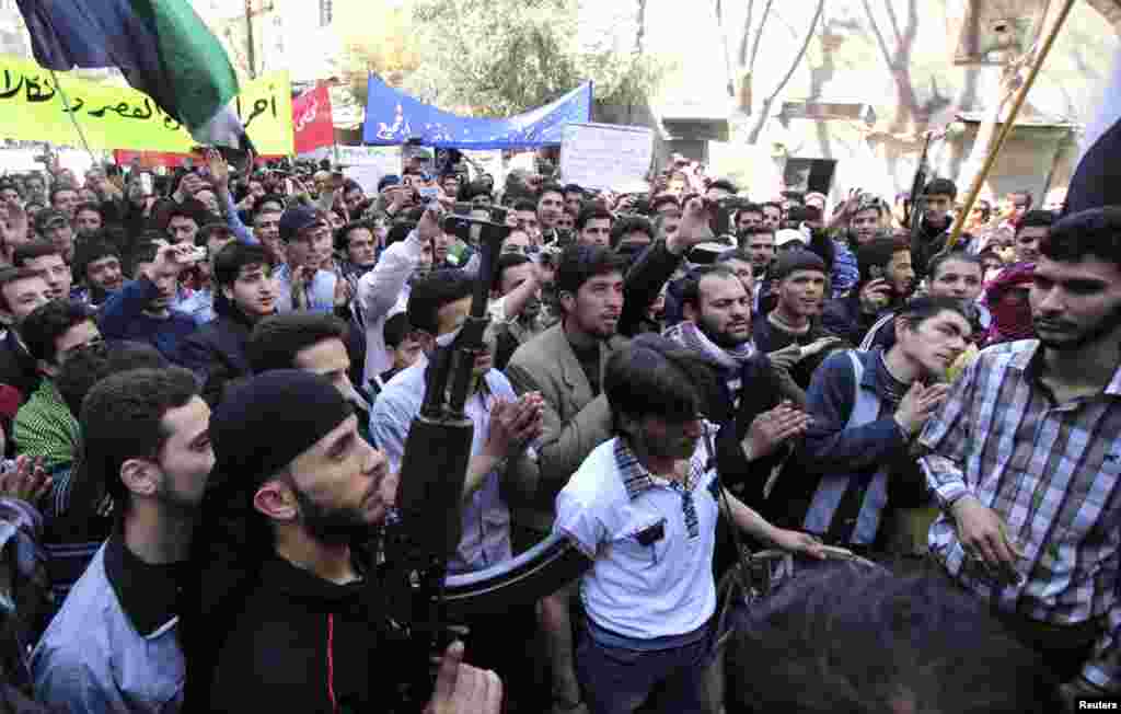 Protests against Syria's President Bashar al-Assad take place in Aleppo, March 29, 2013.