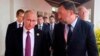 FILE - Russia's President Vladimir Putin, left, and Russian metals magnate Oleg Deripaska, right, attend the APEC Business Advisory Council dialogue in Danang, Vietnam, Nov. 10, 2017.