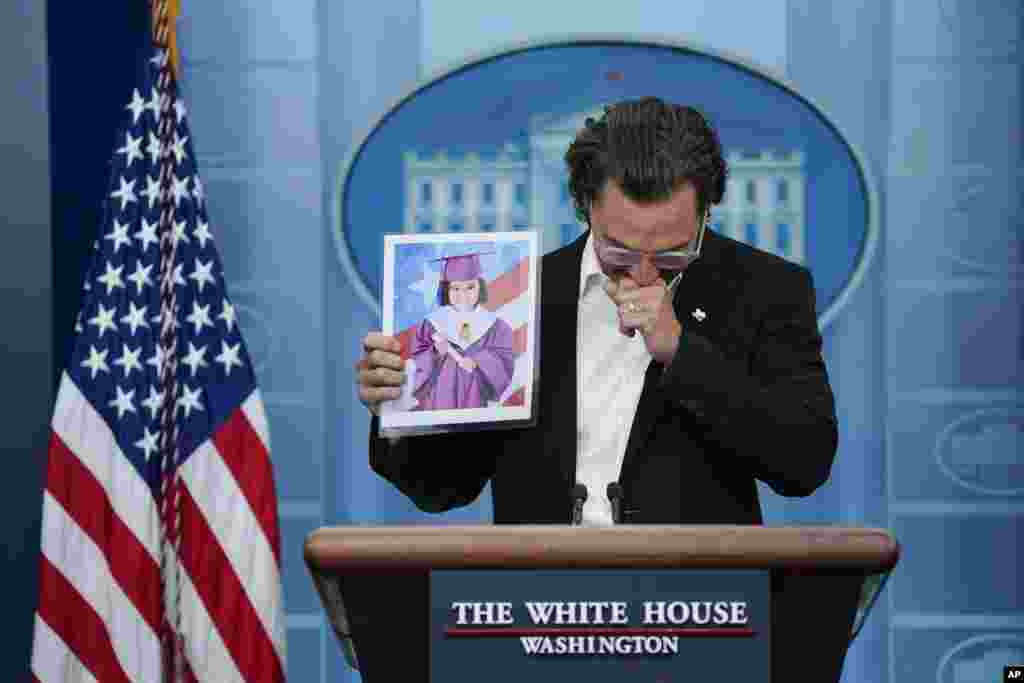 Actor Matthew McConaughey reacts as he holds an image of Alithia Ramirez, 10, who was killed in the mass shooting at an elementary school in Uvalde, Texas, as he speaks during a press briwhile speaking at the White House in Washington, June 7, 2022.