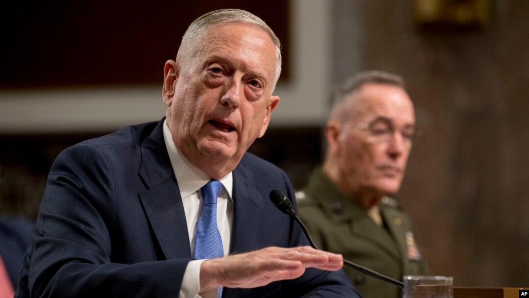 Defense Secretary Jim Mattis, left, accompanied by Joint Chiefs Chairman Gen. Joseph Dunford, speaks before the Senate Armed Services Committee on Capitol Hill in Washington, Oct. 3, 2017. 