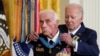 U.S. President Joe Biden awards the Medal of Honor to U.S. Army veteran Maj. John Duffy, in the East Room at the White House in Washington, U.S., July 5, 2022. 