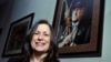 FILE - Marilynn "Lynn" Malerba stands next to a photograph of late Chief Ralph Sturges at Tribal offices in Uncasville, Connecticut, on March 4, 2010. Malerba, who is Native American, was nominated by President Joe Bident to be U.S. Treasurer, Tuesday, Ju