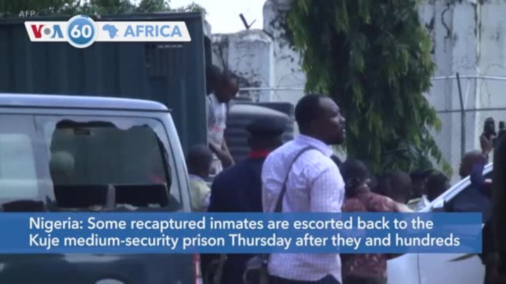 VOA60 Africa- Some recaptured inmates are escorted back to the Kuje medium-security prison Thursday in Nigeria after Tuesday's attack