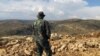 Hezbollah Stirs Controversy with Military Parade in Syria