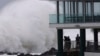 Cyclone Alfred stalls off Australia's east as millions brace for impact