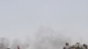 Rebels Seize 2 Towns Near Libyan Capital