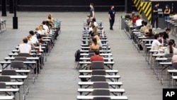 Students in Germany have resumed classes under restrictions.