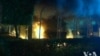 The U.S. Consulate in Benghazi, Libya burns during a September 2012 attack that killed the U.S. Ambassador and three others. 
