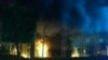 The U.S. Consulate in Benghazi, Libya burns during a September 2012 attack that killed the U.S. Ambassador and three others. 