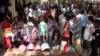 Cambodian residents line up to vote in local elections at a polling station in Chak Angre Leu on the outskirts of Phnom Penh, Cambodia, June 4, 2017. 