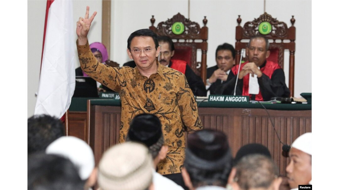 Jakarta's Governor Basuki "Ahok" Tjahaja Purnama gestures inside the courtroom during his blasphemy trial in Jakarta, Indonesia, Jan. 3, 2017.