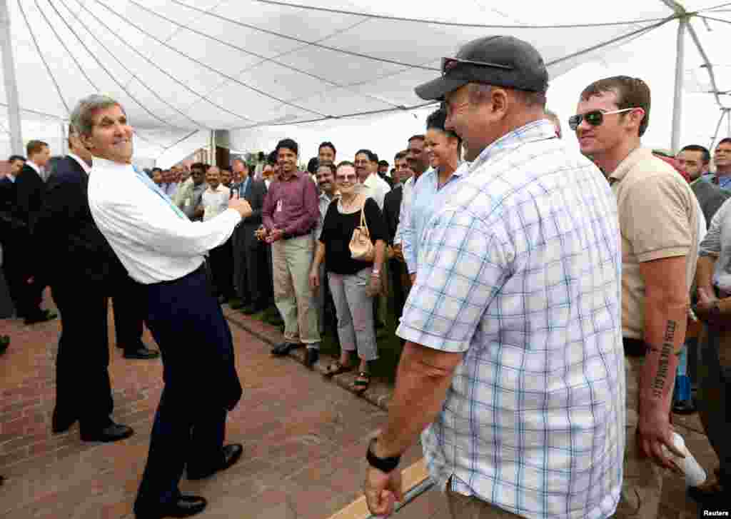 U.S. Secretary of State John Kerry meets staff at the U.S. Embassy in Islamabad August 1, 2013. 