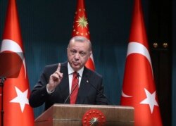 FILE - Turkey's President Recep Tayyip Erdogan speaks during a ceremony at the presidential palace, in Ankara, Turkey, May 6, 2019.