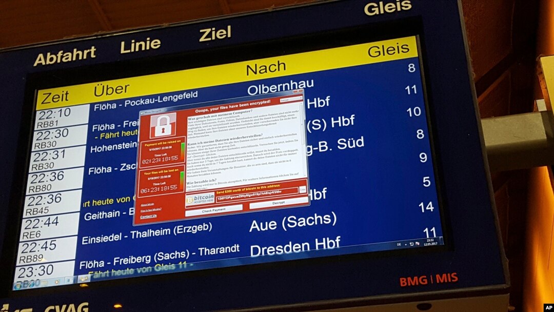 A display panel with an error can be seen at the main railway station in Chemnitz, Germany, May 12, 2017. Deutsche Bahn said early Saturday that departure and arrival display screens at its stations were hit Friday night by the attack.