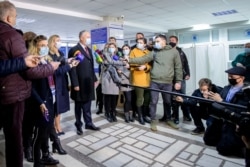 Incumbent Moldovan President Igor Dodon speaks to media after casting his vote in the country's presidential elections in Chisinau, Moldova, Nov. 1, 2020.