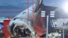 Jirgin saman Jeju Air Boeing 737-800 da ya kama da wuta bayan ya bugi wani bango a tashar jirgin saman Muan International Airport a South Jeolla Province, Dec. 29, 2024.