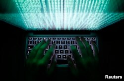 FILE - Hackers have perpetrated massive data breaches. (Photo illustration)
