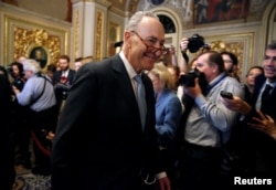 Senate Minority Leader Chuck Schumer (D-NY) walks from a Democratic caucus meeting during the third day of a shut down of the federal government in on Capitol Hill in Washington, Jan. 22, 2018.