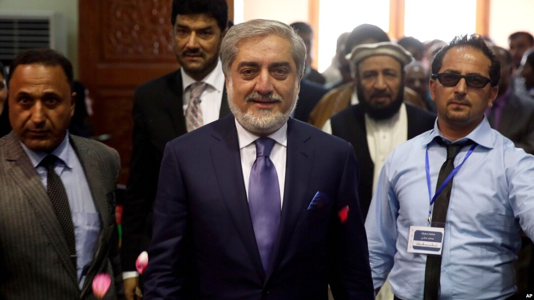 Abdullah Abdullah who is to become Afghanistan's chief executive arrives to speak to his supporters in Kabul, Afghanistan, Sept. 25, 2014. 