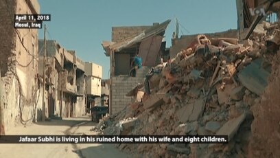 Family Returns to Crumbling Home in Old Mosul
