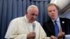 Pope Francis speaks with the media onboard a plane during his flight back from a trip in Dublin, Ireland Aug. 26, 2018.