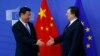 Chủ tịch Ủy ban Liên minh châu Âu Jose Manuel Barroso tiếp Chủ tịch Trung Quốc Tập Cận Bình (trái) tại trụ sở Ủy ban ở Brussels, 31/3/14