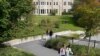 FILE - College students wear masks our of concern for the coronavirus on the Boston College campus, Sept. 17, 2020, in Boston.