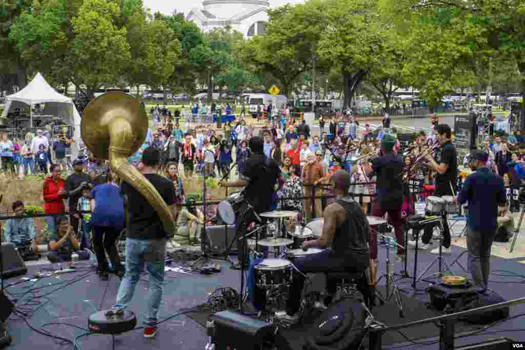 Percussionists of Red Baraat play during their performance. (T. Hart/VOA)