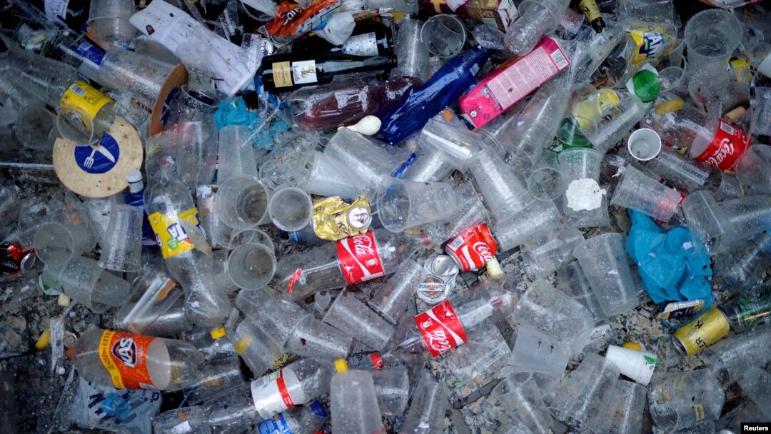 Plastic and glass waste lies on the ground during the Tamborrada on the Day of San Sebastian in the Basque coastal town of San Sebastian, Spain, Jan. 20, 2018. 