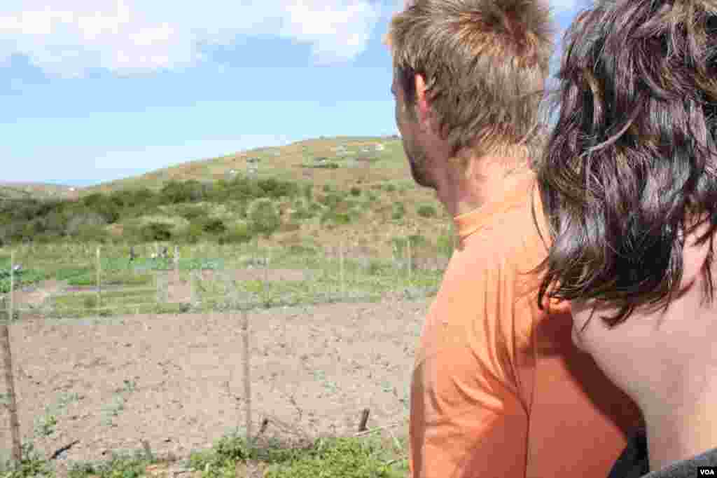 Alex and Michael Gunther gaze over their land in Hobeni in South Africa’s Eastern Cape province (VOA/Taylor)
