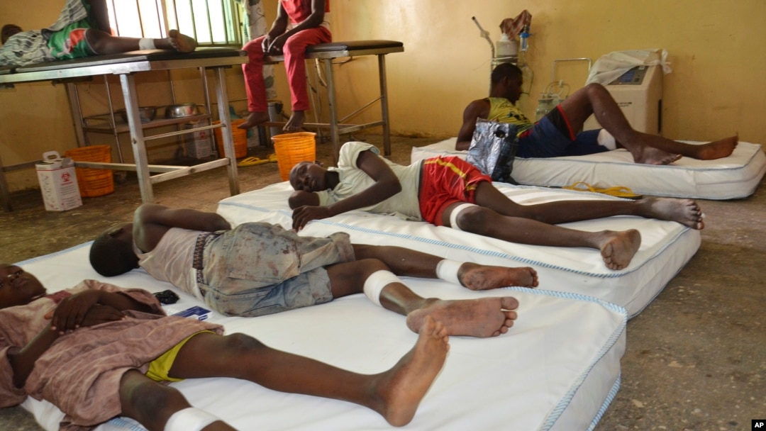 Victims receive treatment at a hospital, after an explosion in Maiduguri, Nigeria, June 17, 2015.