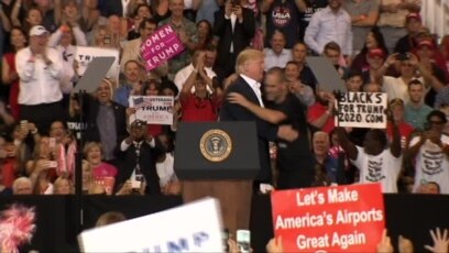 Trump Allows Supporter Onstage at Florida Rally