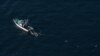 An aerial photograph shows a fishing boat off the coast of Tokyo, Dec. 16, 2019. Five Japanese fishing vessels were seized by Russia on Dec. 18, 2019.