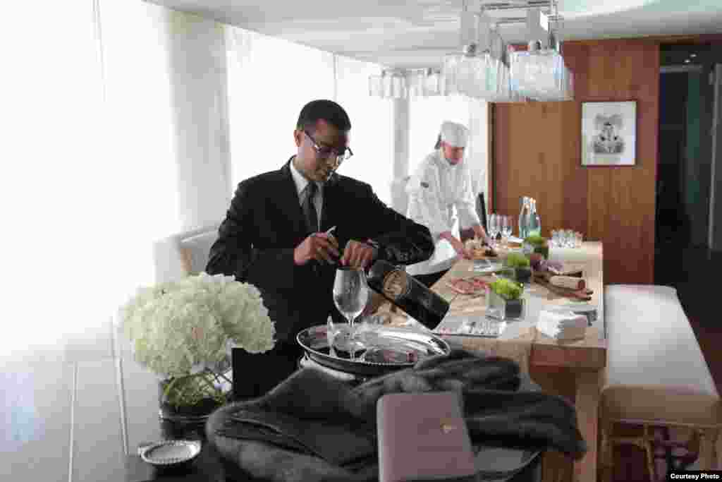 A butler and cheese specialist work at the presidential suite at Washington's Park Hyatt hotel. (Park Hyatt)