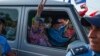 El presidente nicaragüense Daniel Ortega y su esposa la vicepresidenta Rosario Murillo llegan a Masaya, Nicaragua, el viernes 13 de julio de 2018. (Foto AP/Cristóbal Venegas)