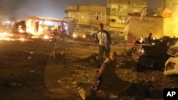 This screen grab taken from Al-Hadath Channel video on Jan. 23, 2018, shows debris at the site of a deadly explosion in Benghazi, Libya. 