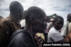 Moses Sokiri, whose son Duku Evans was killed November 3 amid fighting between government troops and rebels in Logo displaced persons camp in Kajo Keji, South Sudan, weeps at his son's funeral on the Ugandan border, Nov. 5, 2017.
