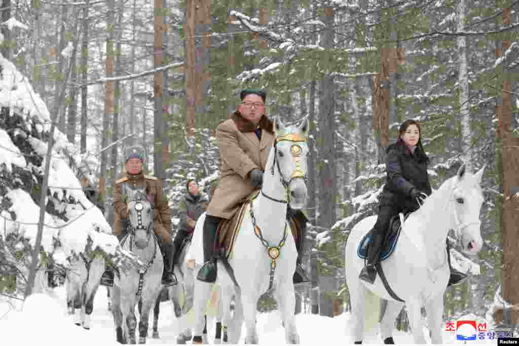 North Korean leader Kim Jong Un rides a horse as he visits battle sites in areas of Mt Paektu, Ryanggang, in this undated picture released by North Korea's Central News Agency (KCNA).