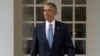 President Barack Obama walks along the colonnade of the White House in Washington, to the residence from the Oval Office, hours before giving his State Of The Union address, Jan. 12, 2016.