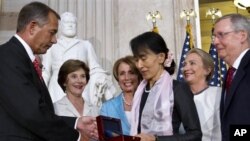 19, 2012, as former first lady Laura Bush, back left, House Democ