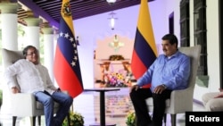 El presidente de Colombia, Gustavo Petro, y su homólogo venezolano, Nicolás Maduro, se reúnen en Caracas, Venezuela, el 23 de marzo de 2023.
