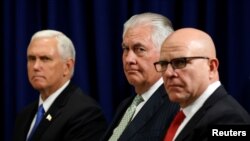 U.S. Vice President Mike Pence (L), Secretary of State Rex Tillerson (C)and U.S. National Security Adviser H.R. McMaster (R) listen as U.S. President Donald Trump meets with Ukraine President Petro Poroshenko during the U.N. General Assembly in New York, Sept. 21, 2017.