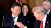 President Donald Trump shakes hands with Chinese President Xi Jinping during a dinner at Mar-a-Lago, in Palm Beach, Florida, April 6, 2017.
