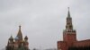 Police officers walk along the Red Square after the city authorities announced a partial lockdown to prevent the spread of coronavirus disease (COVID-19), in central Moscow, Russia, March 30, 2020. 