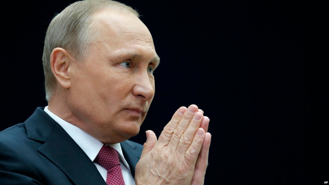 Russian President Vladimir Putin gestures speaking to the media after his annual live call-in show in Moscow, Russia, June 15, 2017. 