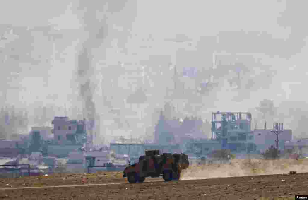 Kobanida jangari manzillariga qarshi AQSh yetakchiligidagi xalqaro koalitsiya havodan zarba berishda davom etmoqda, Kobani, Suriya, 29-oktabr, 2014-yil.