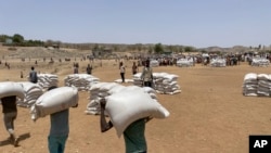 ፋይል - ሓገዝ ኣብ ዝወሃበሉ እዋን ዝተወስደ