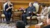 Algerian President Abdelaziz Bouteflika (C) meets with U.S. Secretary of State Hillary Clinton (L) at the Mouradia Palace in Algiers, October 29, 2012. 