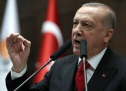 President of Turkey and leader of Justice and Development (AK) Party Recep Tayyip Erdogan speaks at the party's group meeting at Grand National Assembly of Turkey in Ankara, on Feb. 12, 2020.